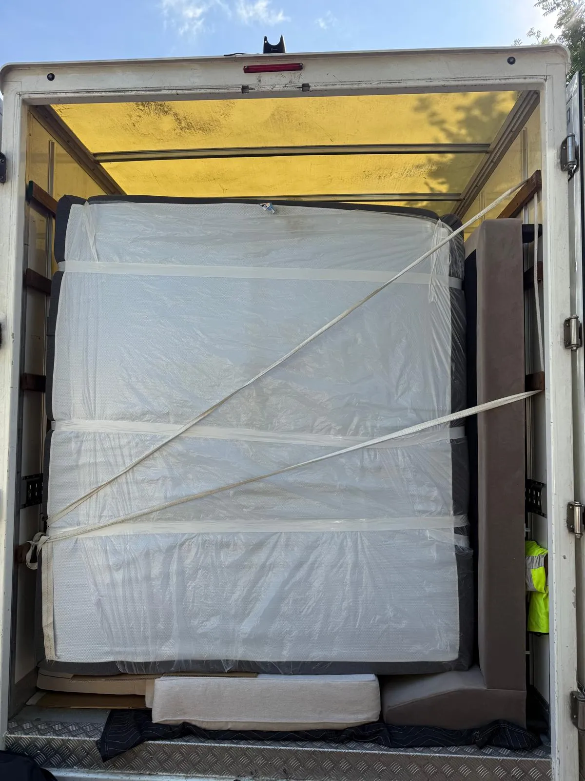 The open back of a loaded van